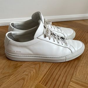 Common Projects White Calfskin Sneakers.